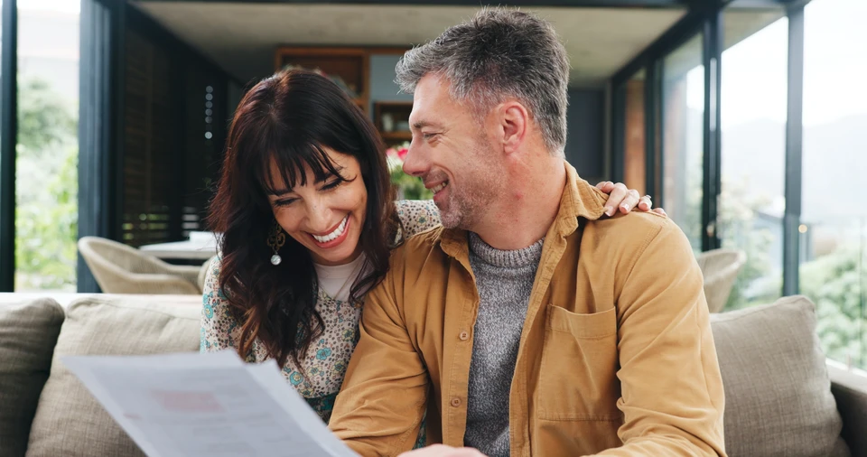 Thermal insulation mineral rock wool installation at the new building attic ceiling